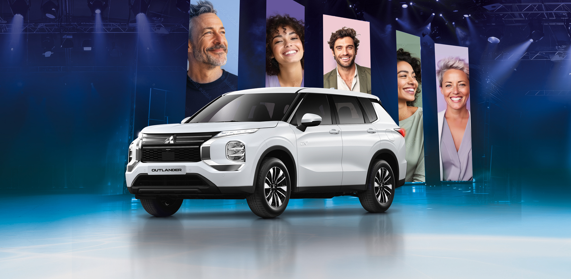 Der Outlander BASIS. Das günstige Einstiegsmodell Eine Bühne mit dem Outlander BASIS und Bannern im Hintergrund auf denen lachende Menschen zu sehen sind